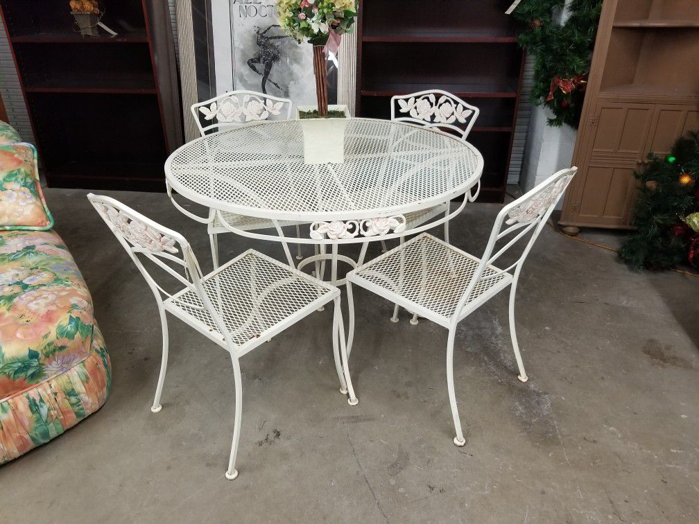 Patio table w/4 chairs 🎃 We are located at 2811 E. Bell Rd.  We are Another Time Around Furniture