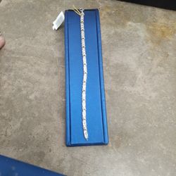 TENIS BRACELET 10K  2 TONE DIAMOND  12.O GR ,7 INCHES 