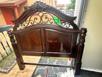 Ornate Dark Wood Queen bed frame and marble top end table