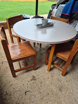 Round table and 4 wooden chairs