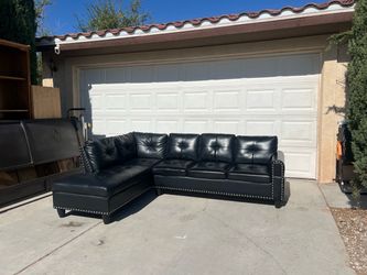 2PC Sectional W/ Drink Holder! (Has some rips)