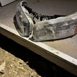 99 to 2006  yukon sierra headlights