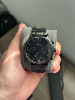 Men’s Fossil quartz blacked out watch .
