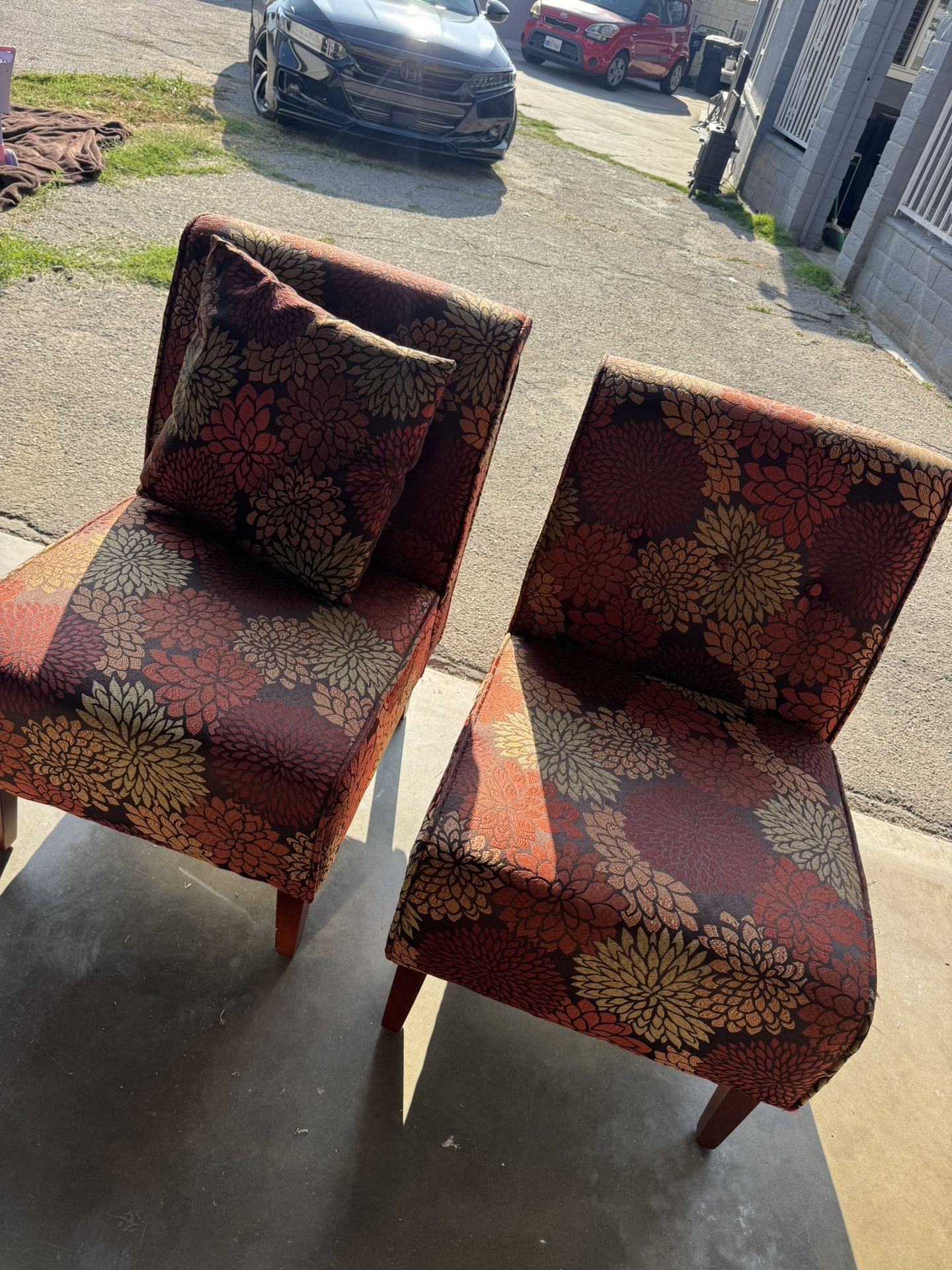 Two Single Cushioned Chairs