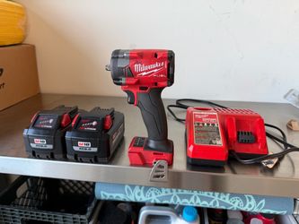 Milwaukee M18 3/8 Impact + 2 18v batteries + Charger