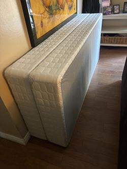 Cal King box spring set. Like new