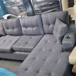 BRAND NEW SECTIONAL COUCH WITH CUP HOLDERS