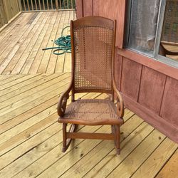 Antique rocking  chair ( Rattan and solid wood)