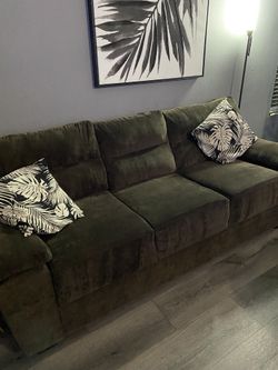Color A Tone Gray Brownish. Couch Seats 4-5 People Very Clean. No longer Is Used. No Pets Home