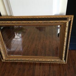 Antique Beveled Mirror with gold grit.