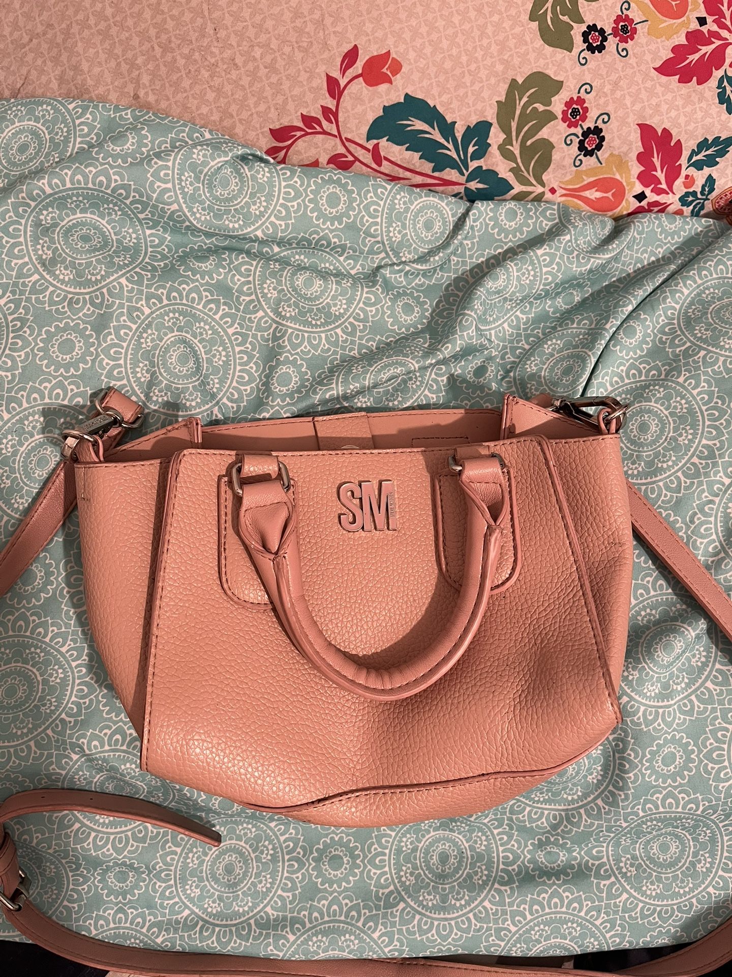 Pink leather bag with silver hardware 