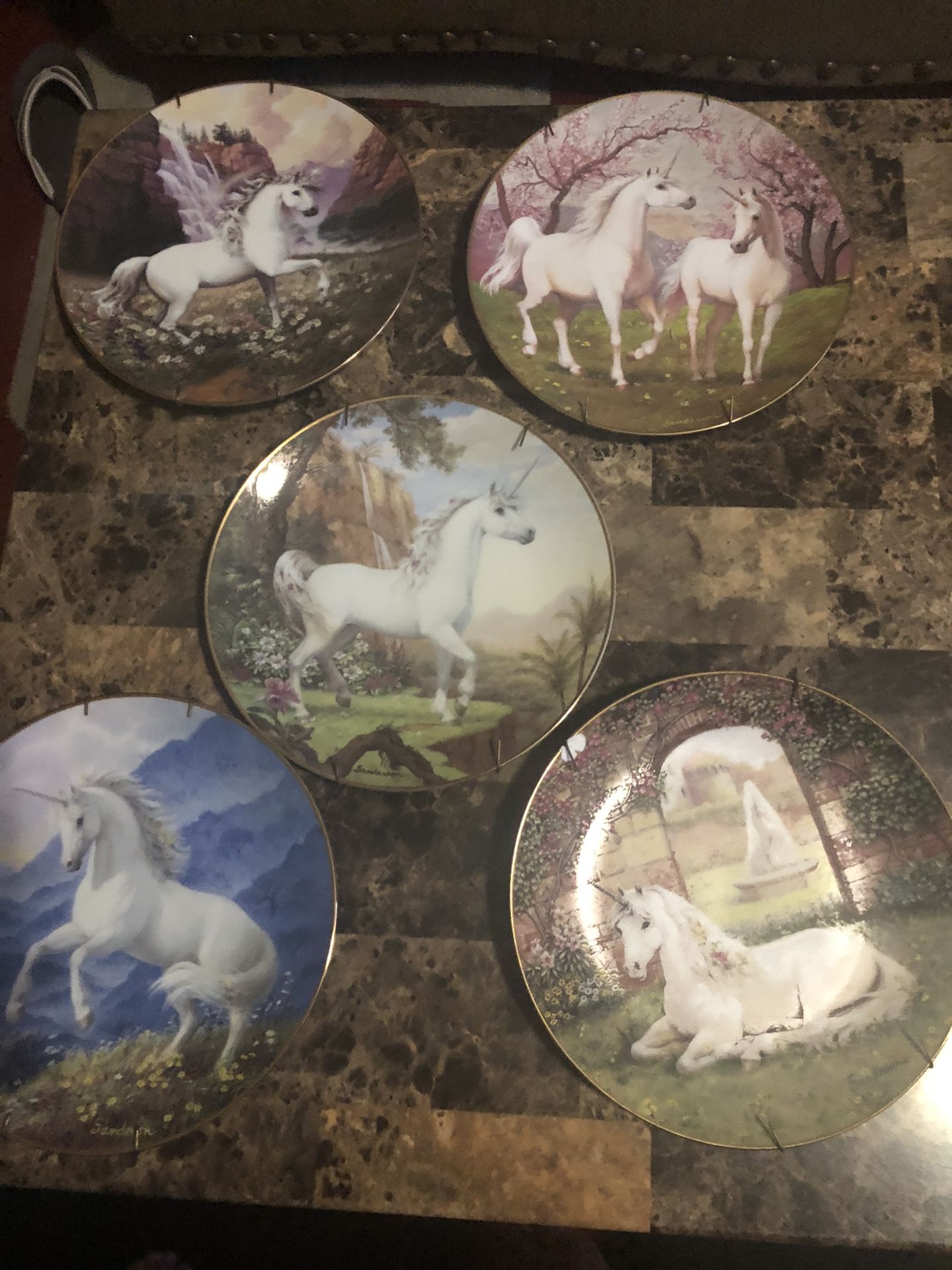The enchanted world of the unicorn plate collection