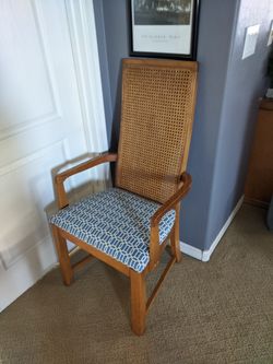 Blue and white padded wooden chair
