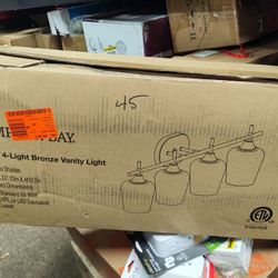 Hampton Bay Pavlen 4 Light Bathroom Vanity Light Fixture In Bronze