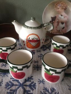Hand painted six piece tea server and cups.