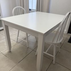 White Table And 2 Chairs