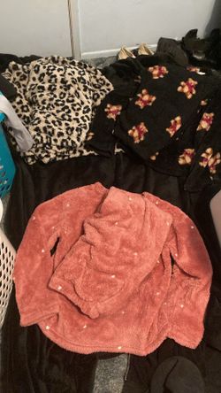 Three pairs of fluffy pajamas