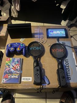Nintendo switch and accessories with tennis