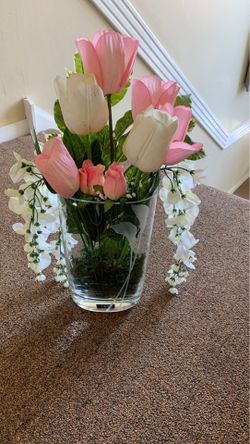 Pink and white faux flowers in pretty vase