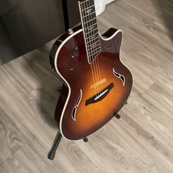 Guitar..Taylor T5..excellent Condition. 81year senior is cleaning house..Soft case included