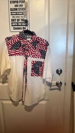 FESTIVE 4th of July shirt- Med this is a wonderful shirt. Maybe it's not too late for you if you're going to a party it's a ladies medium.