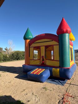 Bounce house jumper with blower