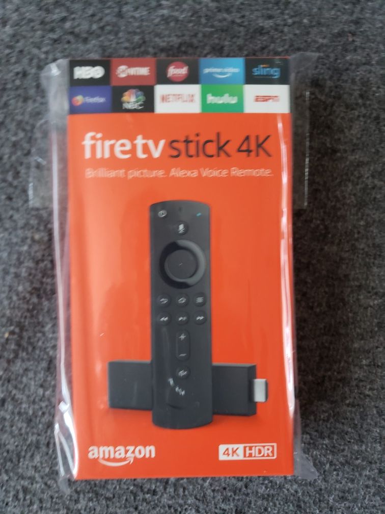 Brand new sealed unopened Fire TV stick 4k. Buy soon.