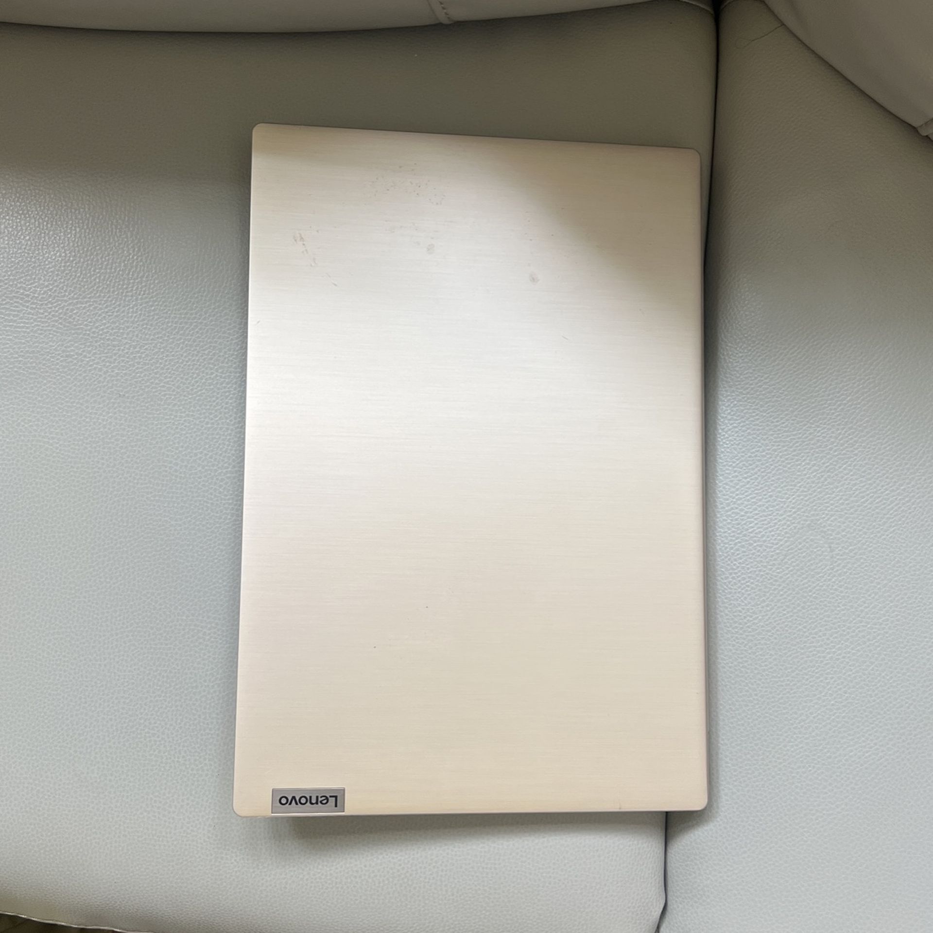 Gold Lenovo laptop