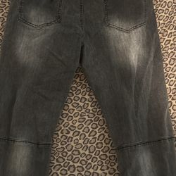 grey ripped jeans