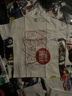 Large white and red awful lot of kicks shirt