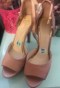 Jessica Simpson. Light pink high heels