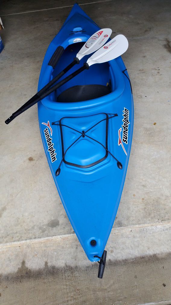 Sundolphin 10 foot sit in kayak with paddle. 2 years old, used twice. Sells new at $498.00, will sell for $325.00.