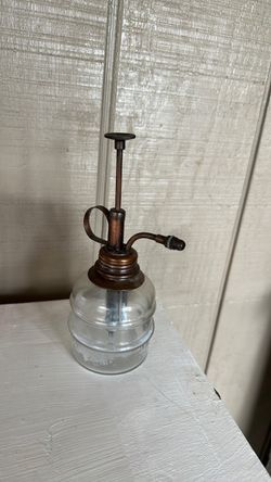 Antique plant watering