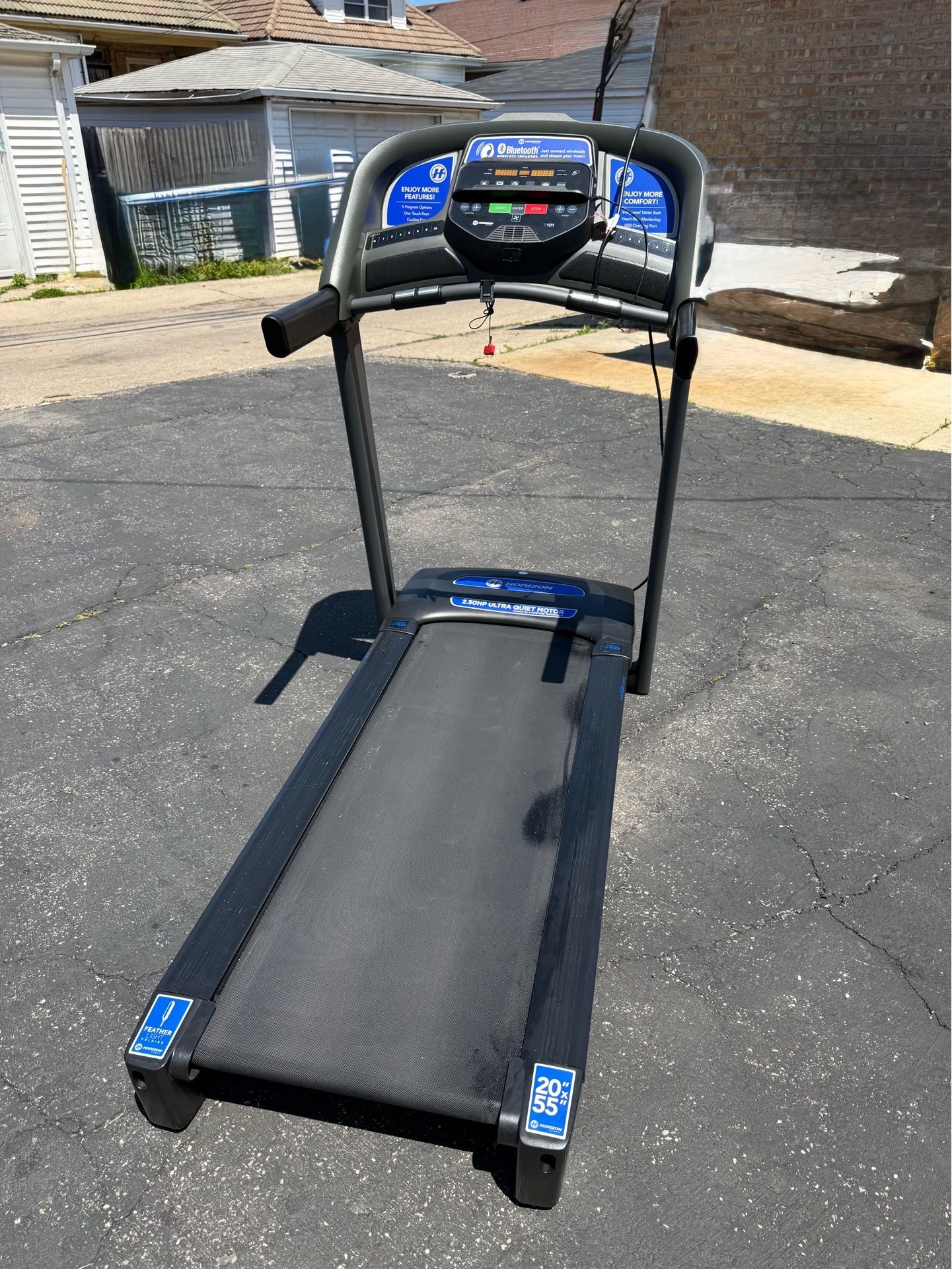 HORIZON 2.5 H.P. TREADMILL IN EXCELLENT CONDITION AND MANY BELLS AND WHISTLES. $200.00 OR BEST OFFER.