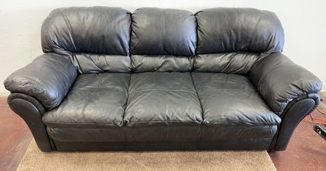 Black leather couch Bed! Delivery Available!
