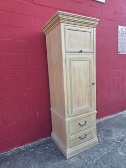 Tall & Narrow shelf cabinet, tons of storage, all doors and drawers work excellent, used to be part of a bigger unit, only this left for $65