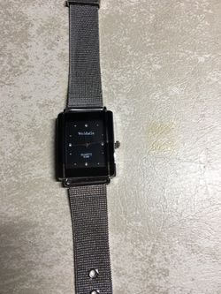 Woman’s fashion watch silver mesh