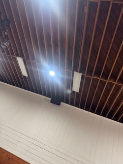 12- 4 ft fluorescent light fixtures w/lenses and some bulbs