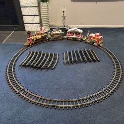 Vintage The Holiday Express Train - electric - runs well- animated - lights up - extra track