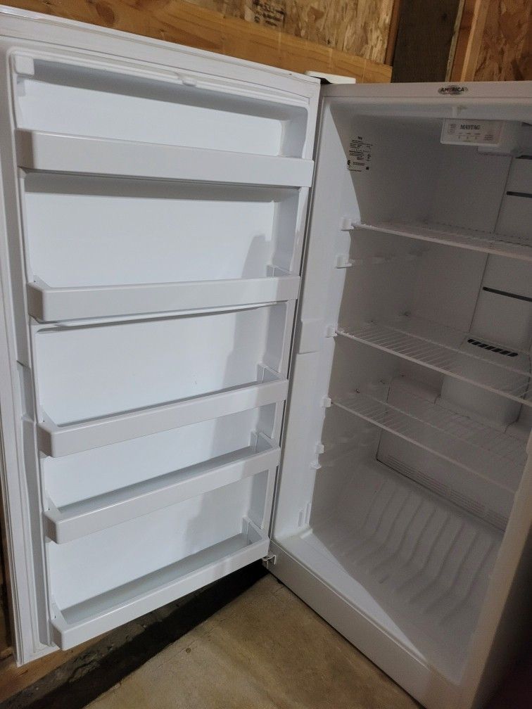 30 X 61 Inch Tall Freezer Good Working 