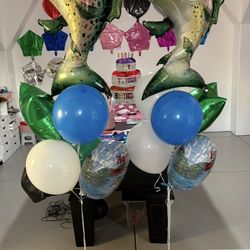 Fish balloons bouquets / located by Ming and ash .