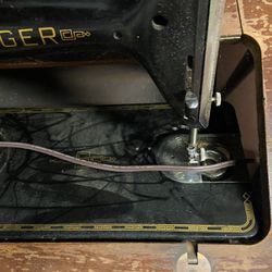 Singer sewing machine with cabinet $50