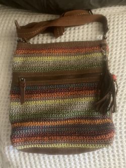 Multi-coloured crochet crossbody bag with leather strap and tassel #crochetbag