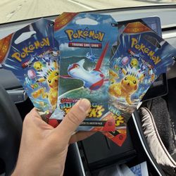 SURGING SPARKS POKÉMON BOOSTER PACKS