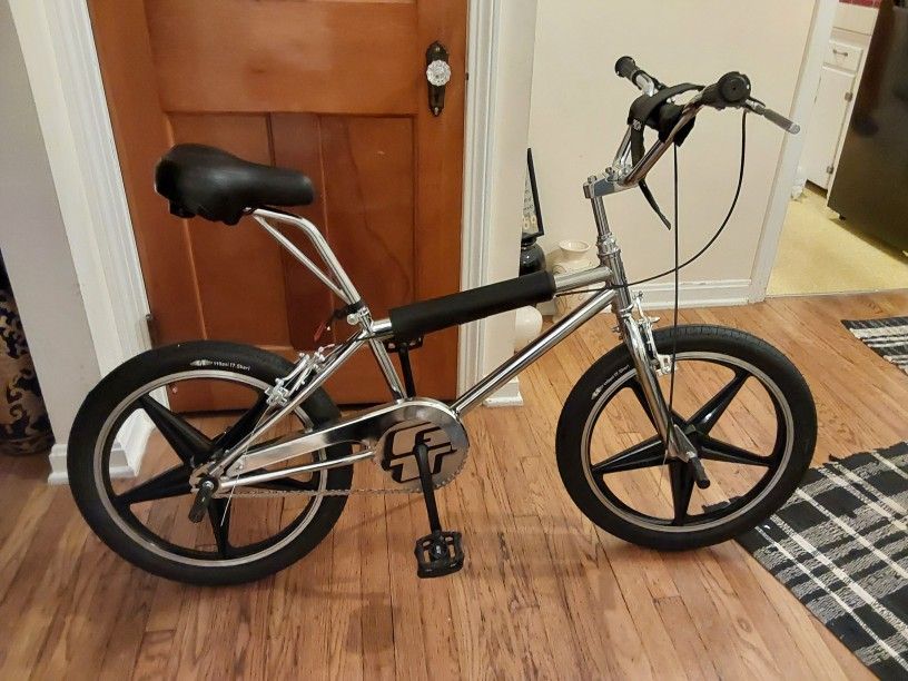 20" Chrome GT BMX With Mag Wheels, Feet Pegs, Free Wheel w/ Hand Brakes