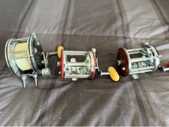 Two Penn Jigmaster 500 reels and Penn 349