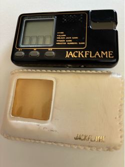 1980’s  Vintage JackFlame Lighter & game
