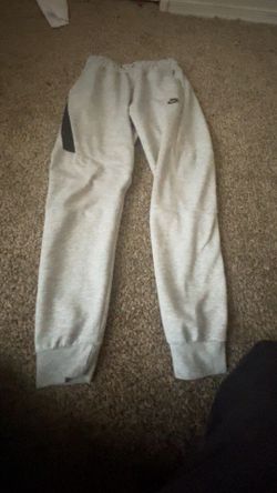 gray Nike tec pants
