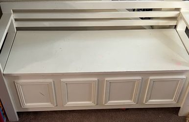 White storage bench used for toys