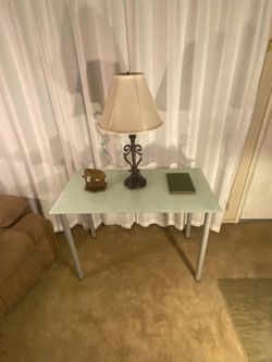 IKEA Frosted Glass Top Desk with Metal Legs. writing desk, makeup vanity, or a compact dining setup